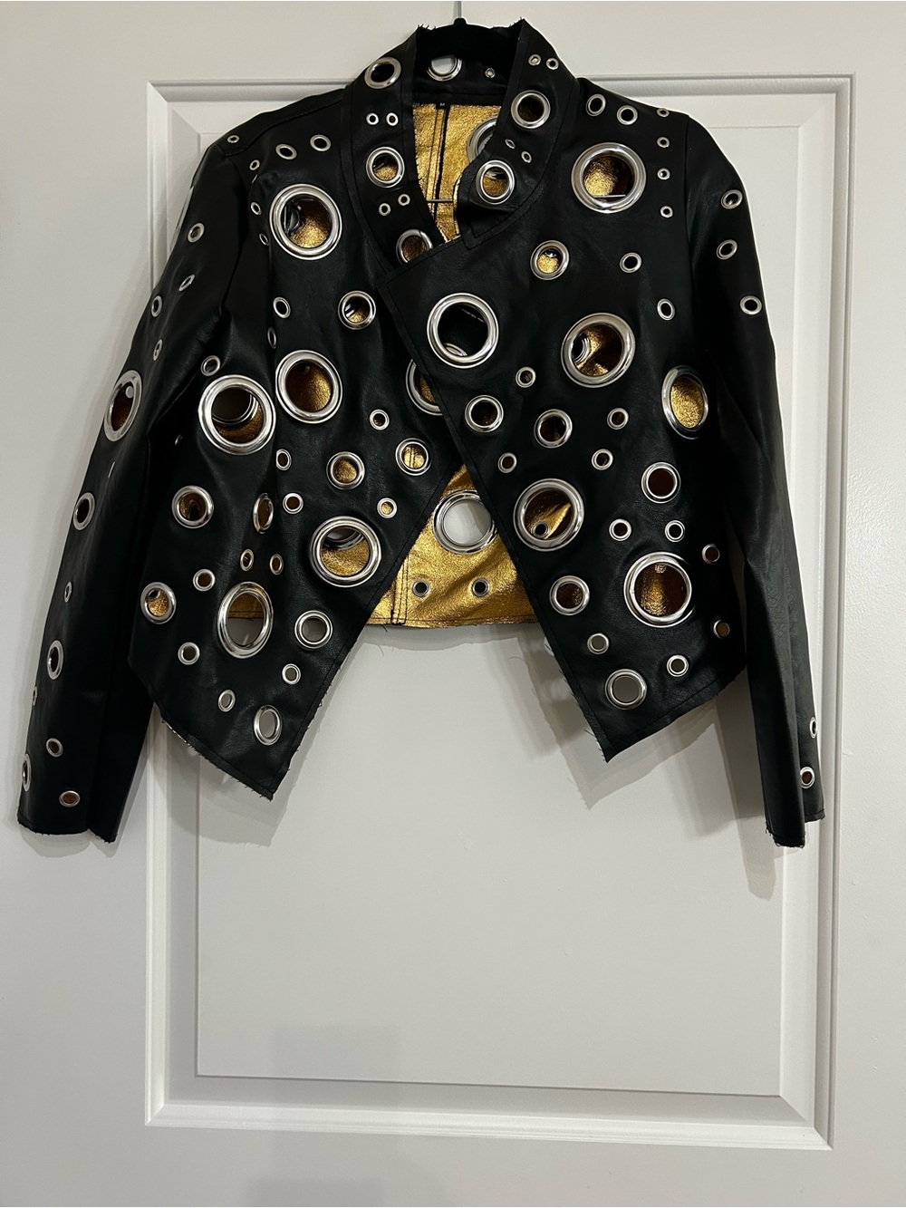 Black Leather Grommet Jacket with Gold Lining